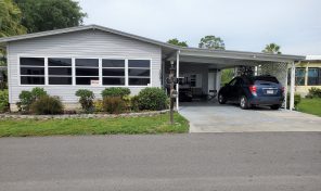 Great updated home with golf cart in Swiss Golf & Tennis