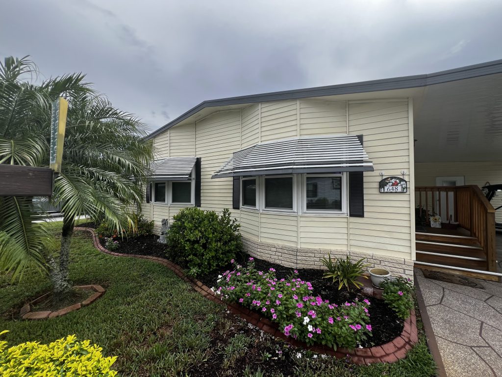 Updated home with golf cart in Swiss Golf & Tennis