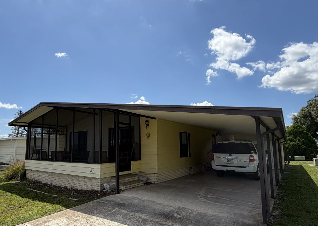 Spacious 2-Bedroom, 2-Bath Home with Two Living Areas, Screened Porch, Workshop & Golf Cart!